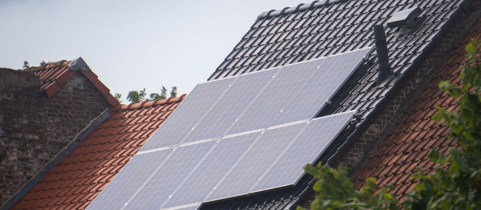 Solar panels fitted to a traditional tiled roof